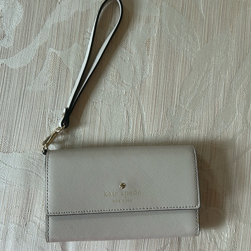 Kate Spade wristlet cream color